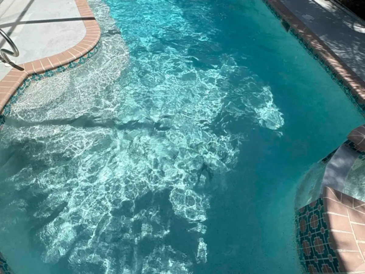 Clean residential pool maintained by Apex Pools
